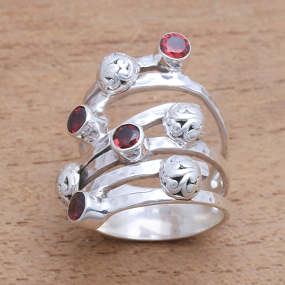 Garnet cocktail ring, 'Exuberant Beauty' - Handcrafted Wide Sterling Silver and Garnet Ring from Bali