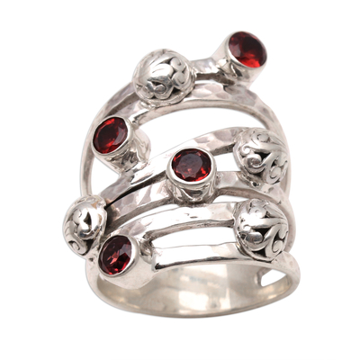 Garnet cocktail ring, 'Exuberant Beauty' - Handcrafted Wide Sterling Silver and Garnet Ring from Bali