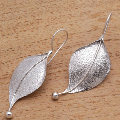 Sterling silver drop earrings, 'Curved Leaves' - Modern Leaf-Shaped Sterling Silver Drop Earrings from Bali