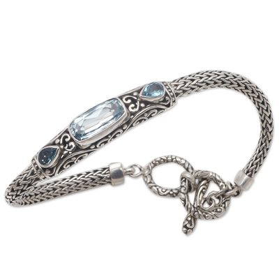 Blue topaz pendant bracelet, 'Splendid Bali' - Faceted Blue Topaz Pendant Bracelet from Bali