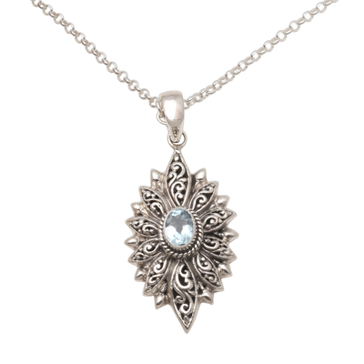 Blue topaz pendant necklace, 'Glittering Snowflake' - Swirl Pattern Blue Topaz Pendant Necklace Crafted in Bali