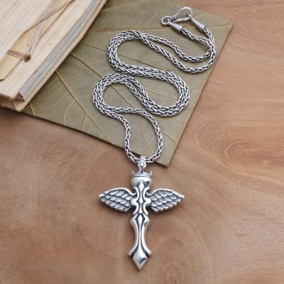 Sterling silver pendant necklace, 'Crowned Cross' - Silver Cross Pendant Necklace with Outspread WIngs