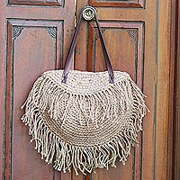 Hand-woven leather-accented natural fiber shoulder bag, 'Balinese Crescent' - Hand Woven Leather Accented Shoulder Bag