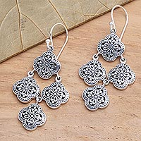 Sterling silver chandelier earrings, 'Four-Petaled Flowers' - Sterling Silver Chandelier Earrings from Bali