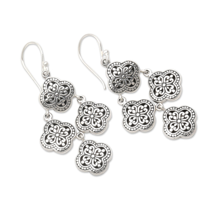 Sterling silver chandelier earrings, 'Four-Petaled Flowers' - Sterling Silver Chandelier Earrings from Bali