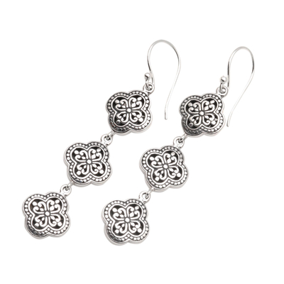 Sterling silver dangle earrings, 'Four-Petaled Flowers' - Artisan Crafted Sterling Silver Dangle Earrings