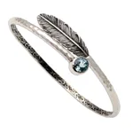 Blue topaz bangle bracelet, 'Sky Feather' - Handcrafted Sterling Silver Bangle Bracelet with Blue Topaz