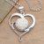 Anhänger-Halskette aus Sterlingsilber und Knochen, 'Blühende Liebe - Blumenmotiv Sterlingsilber und Herz-Halskette aus geschnitztem Knochen
