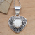 Sterling silver and bone pendant necklace, 'Flower in My Heart' - Sterling Silver and Carved Bone Floral Heart Necklace