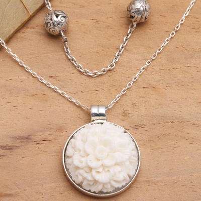 Sterling silver pendant necklace, 'Carnation Stations' - Balinese Carved Carnation and Silver 925 Necklace