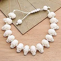 Bone beaded bracelet, 'Bone Collector' - Hand Carved Bone Skull Bead Bracelet