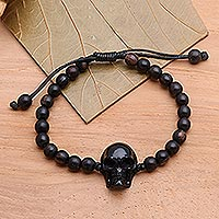 Beaded horn and wood pendant bracelet, 'Dark Visage' - Black Horn Skull Beaded Pendant Bracelet