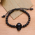 Beaded horn and wood pendant bracelet, 'Dark Visage' - Black Horn Skull Beaded Pendant Bracelet (image 2) thumbail