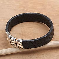 Men's leather and sterling silver wristband bracelet, 'Adaptation'