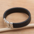 Men's leather and sterling silver wristband bracelet, 'Adaptation' - Black Leather and Sterling Silver Men's Bracelet (image 2) thumbail