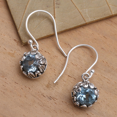 Blue topaz dangle earrings, 'Petite Frangipani Flowers' - Petite Blue Topaz Floral Earrings in Sterling Silver