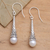 Cultured pearl dangle earrings, 'White Beacon Glow' - Balinese Handcrafted White Cultured Pearl Earrings (image 2) thumbail