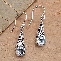 Blue topaz dangle earrings, 'Expression of Joy' - Balinese Fair Trade Silver and Blue Topaz Earrings