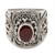 Gold accent garnet cocktail ring, 'Oval Crimson Glow' - Balinese Silver and Oval Garnet Ring with Gold Accents