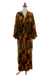 Long rayon batik robe, 'Tropical Leaves' - Hand Stamped Black and Spice Rayon Long Robe from Bali
