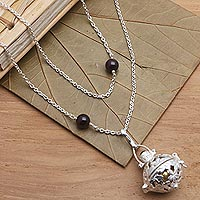 Garnet and peridot harmony ball necklace, 'Plumeria Chime' - Silver & Garnet Plumeria Harmony Ball Necklace with Peridot