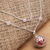 Collar largo bola de armonía de cuarzo rosa, 'Sweet Omkara' - Collar balinés de bolas de armonía de plata y cuarzo rosa