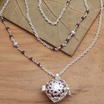 Garnet and cultured pearl harmony ball necklace, 'Angel Lullaby' - Bali Cultured Pearl & Garnet Silver Harmony Ball Necklace