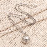 Sterling silver harmony ball necklace, 'Caring Love' - Sterling Silver Amulet Harmony Ball Necklace
