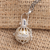 Moonstone harmony ball necklace, 'Protective Goddess' - Silver and Moonstone Harmony Ball Necklace with Brass (image 2) thumbail