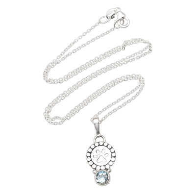 Blue topaz pendant necklace, 'Pawprint Memory' - 18-Inch Necklace with Faceted Blue Topaz Pawprint Pedant