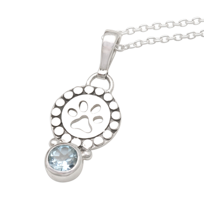 Blue topaz pendant necklace, 'Pawprint Memory' - 18-Inch Necklace with Faceted Blue Topaz Pawprint Pedant