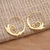 Gold plated half-hoop earrings, 'Keramas Surf' - Swirling 18k Gold Plated Half-Hoop Earrings