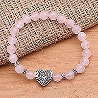 Sterling silver and rose quartz pendant bracelet, 'Baroque Heart in Pink' - Rose Quartz Stretch Bracelet with Silver Heart Pendant