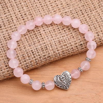 Sterling silver and rose quartz pendant bracelet, 'Baroque Heart in Pink' - Rose Quartz Stretch Bracelet with Silver Heart Pendant