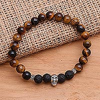 Tiger's eye and onyx beaded stretch bracelet, 'Staring Skull in Brown' - Tiger's Eye Stretch Beaded Bracelet with Sterling Skull