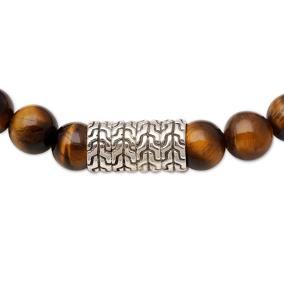 Tiger's eye and sterling silver beaded stretch bracelet, 'Flow Direction in Brown' - Sterling Silver Pendant Bracelet with Tiger's Eye Beads