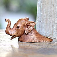 Wood doorstop, 'Elephant Head' - Suar Wood Elephant Head Doorstop