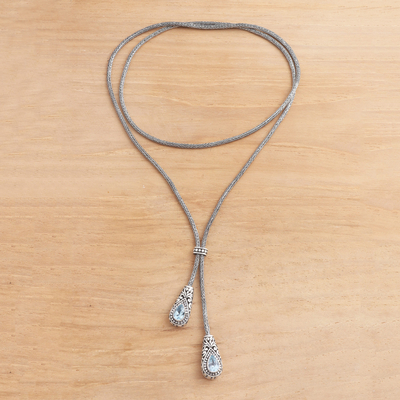Blue topaz lariat necklace, 'Celuk Tears' - Lariat Style Necklace with Blue Topaz Gems