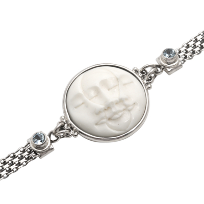 Blue topaz pendant bracelet, 'Three Moon Faces' - Blue Topaz and Sterling Silver Pendant Bracelet