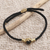 Brass and black agate unity bracelet, 'Golden Handshake' - Bali Brass and Black Agate Cord Unity Bracelet (image 2d) thumbail