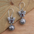Garnet dangle earrings, 'Butterfly Bell' - Garnet and Sterling Silver Butterfly Dangle Earrings thumbail