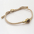 Brass and tiger's eye unity bracelet, 'Golden Handshake' - Bali Brass and Tiger's Eye Beige Cord Unity Bracelet (image 2b) thumbail