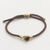 Brass and tiger's eye unity bracelet, 'Golden Brown Handshake' - Bali Brass and Tiger's Eye Brown Cord Unity Bracelet (image 2) thumbail