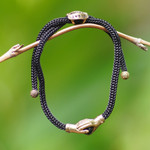 Brass and obsidian unity bracelet, 'Golden Handshake' - Brass and Black Obsidian Cord Unity Bracelet from Bali
