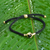 Brass and obsidian unity bracelet, 'Golden Handshake' - Brass and Black Obsidian Cord Unity Bracelet from Bali (image 2) thumbail