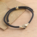 Brass and obsidian unity bracelet, 'Golden Handshake' - Brass and Black Obsidian Cord Unity Bracelet from Bali