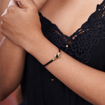 Brass and obsidian unity bracelet, 'Golden Handshake' - Brass and Black Obsidian Cord Unity Bracelet from Bali