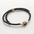 Brass and obsidian unity bracelet, 'Golden Handshake' - Brass and Black Obsidian Cord Unity Bracelet from Bali (image 2f) thumbail