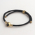 Brass and obsidian unity bracelet, 'Golden Handshake' - Brass and Black Obsidian Cord Unity Bracelet from Bali (image 2g) thumbail