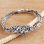 Blue topaz pendant bracelet, 'Two Pears' - Balinese Sterling Silver Pendant Bracelet with Blue Topaz